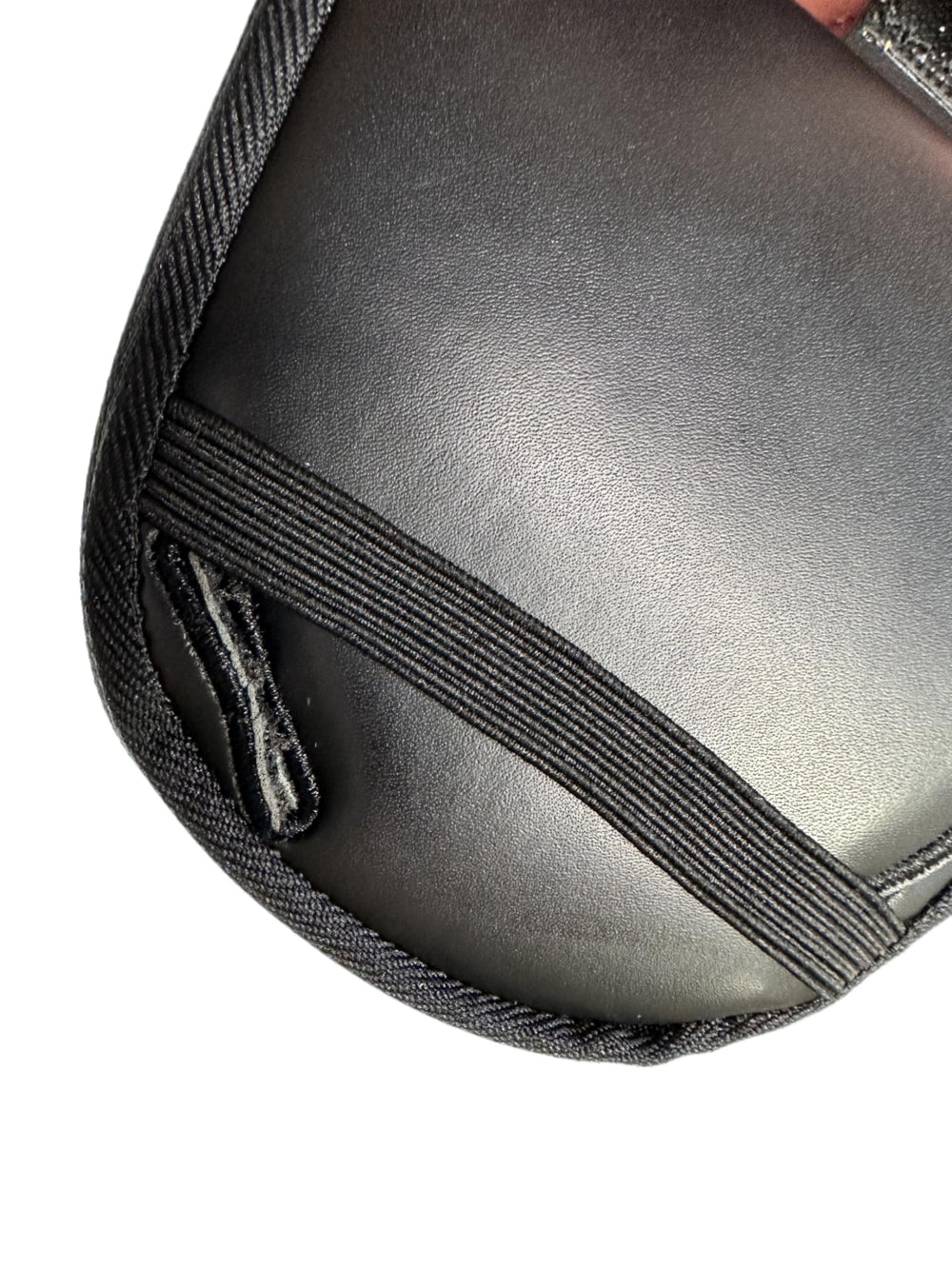 The Helmet Shop size comparison with hand showing compact, low-profile fit