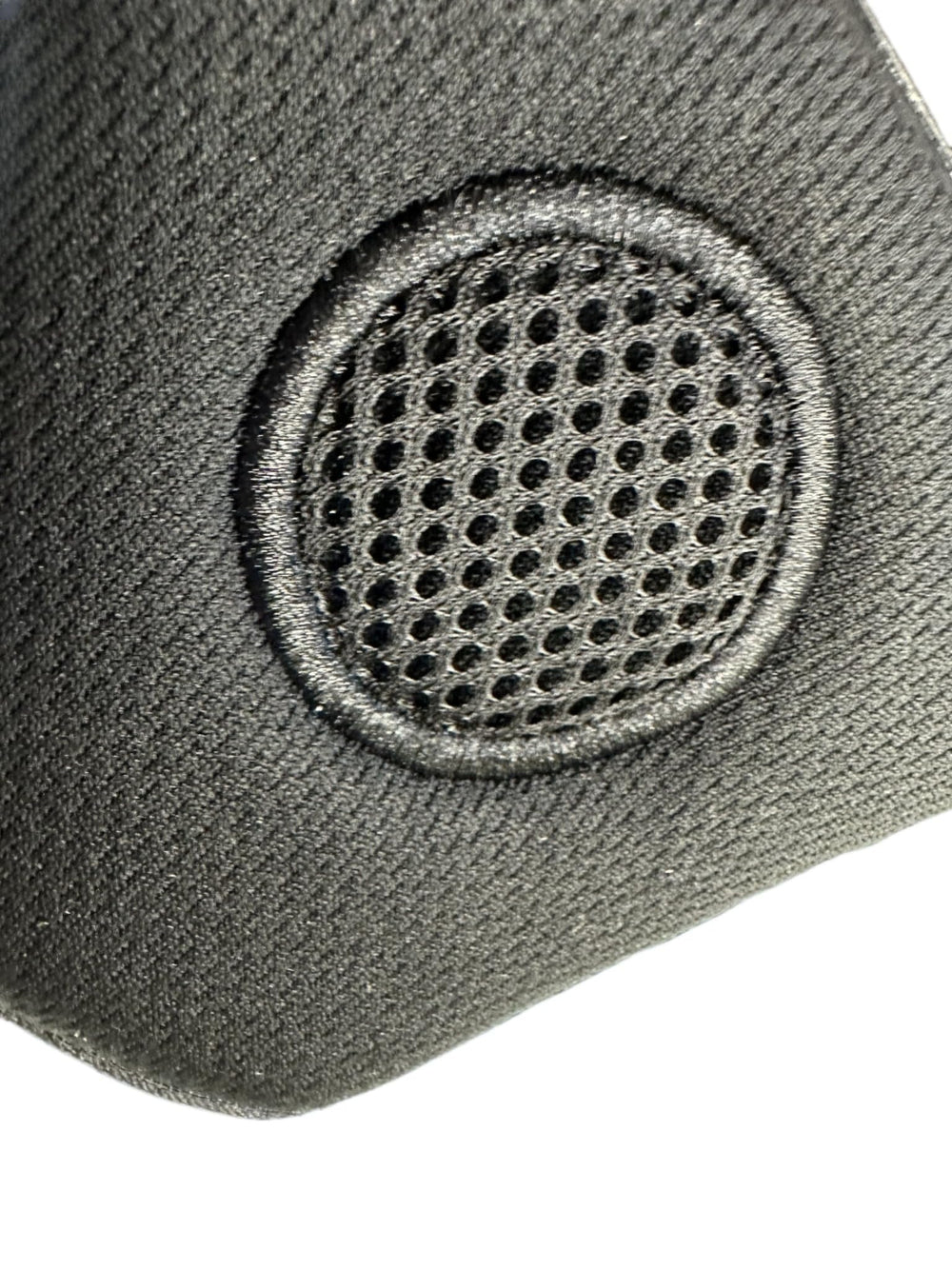 The Helmet Shop upper pigtail cord port for tidy cable routing and management