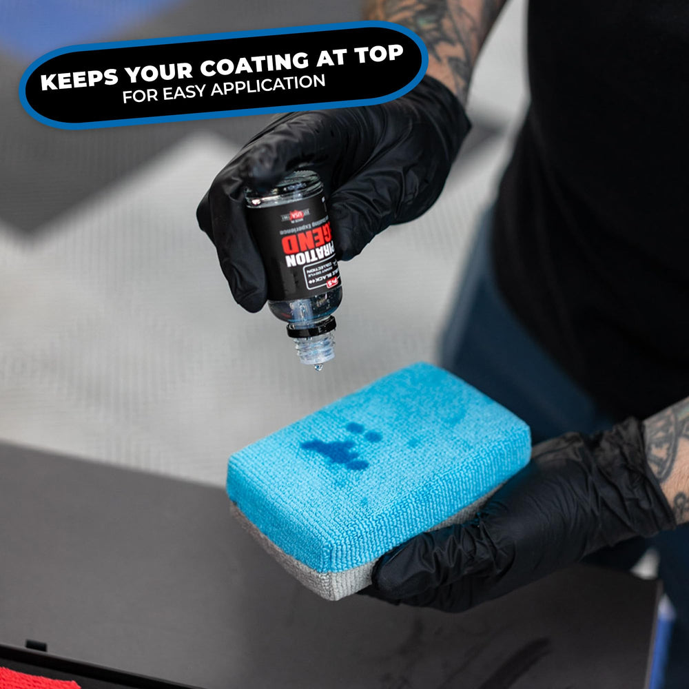 The Rag Company pad held in hand to show compact 3 by 5 inch size and precise control
