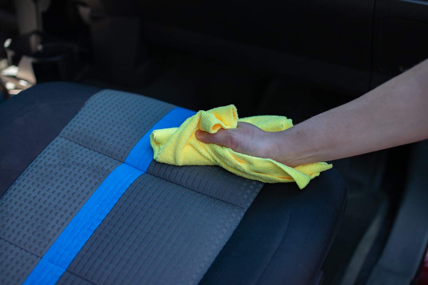 The Rag Company towel removing polish residue for streak-free finishing