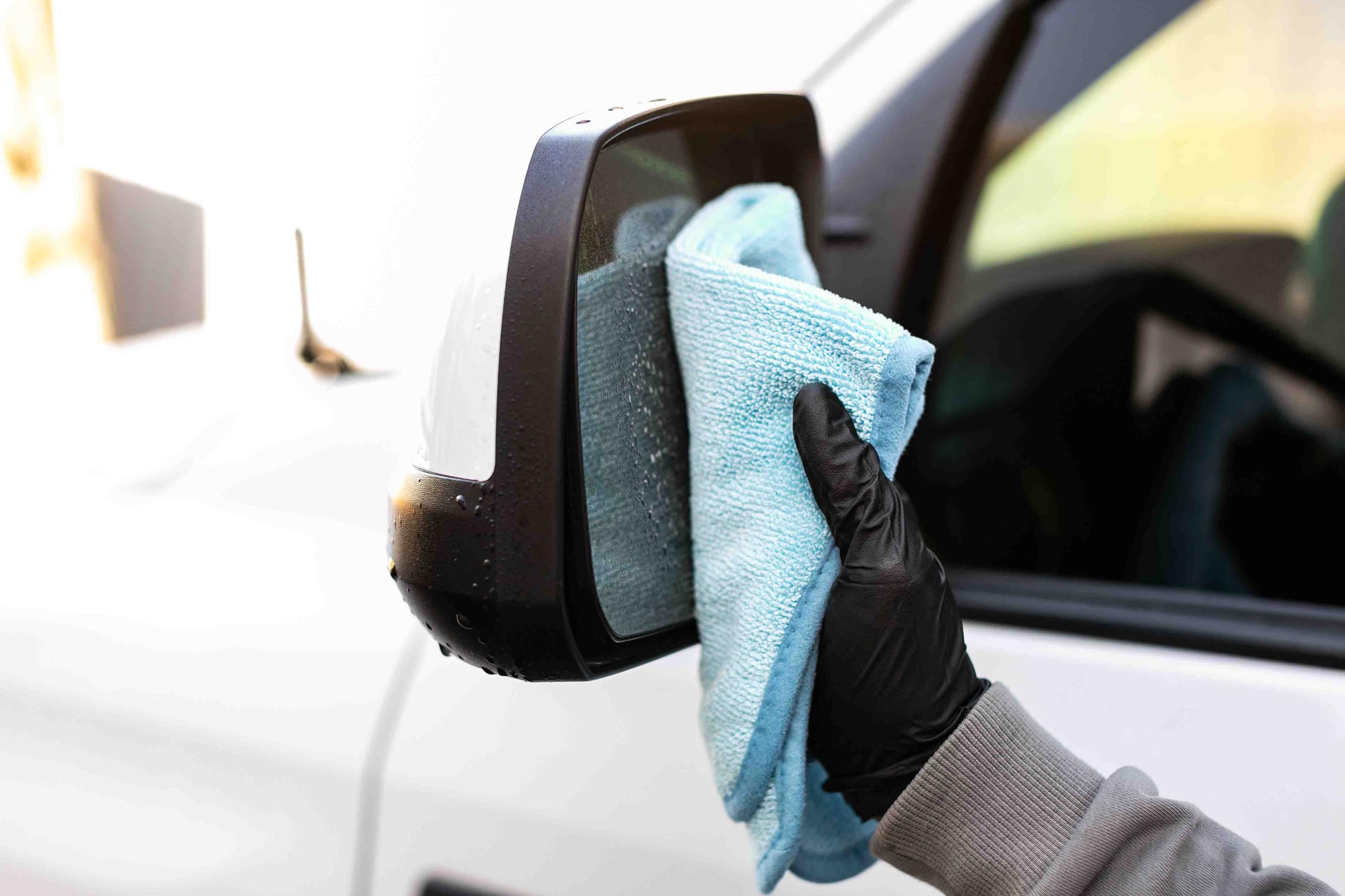The Rag Company FTW towel drying car paint gently without leaving lint or marks
