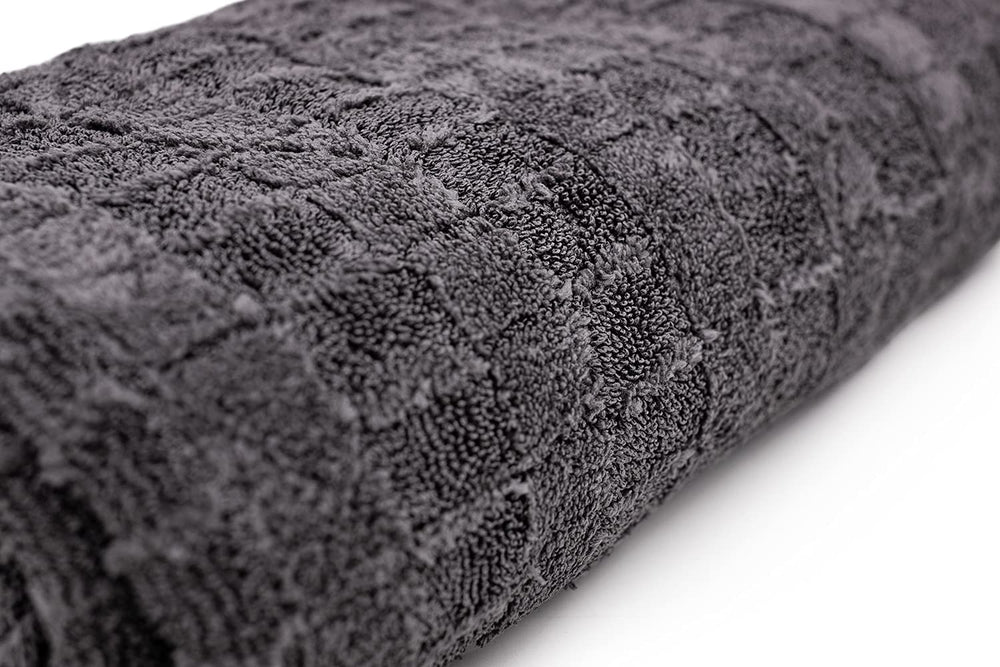 The Rag Company drying a mirror showing gentle finish protection benefit