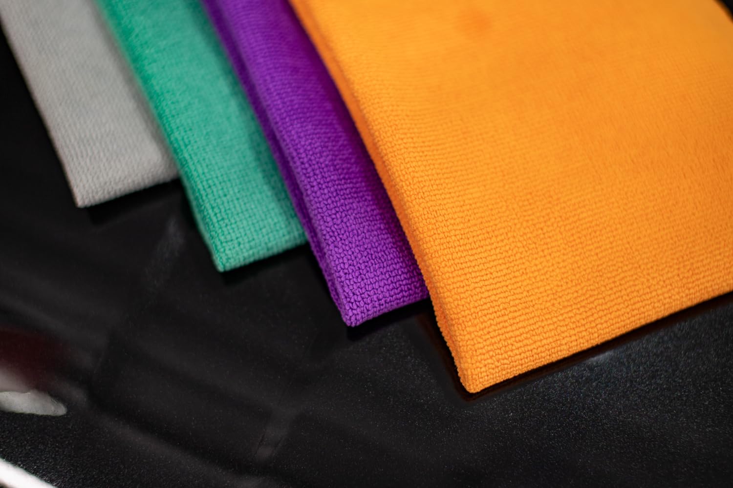 The Rag Company towel cleaning upholstery showing interior scrubbing efficiency and fiber resilience