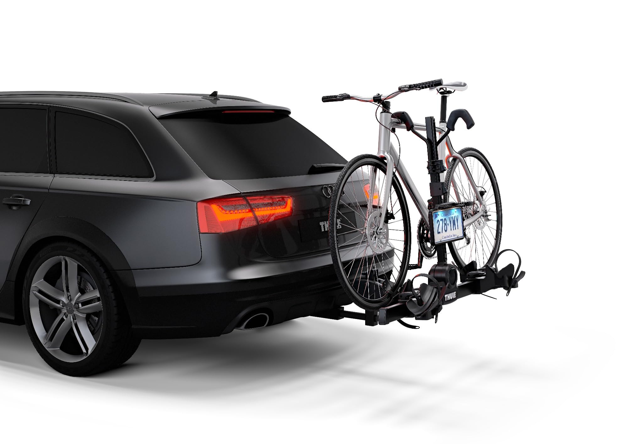Thule license plate holder attached to hanging-style rack showing compatibility