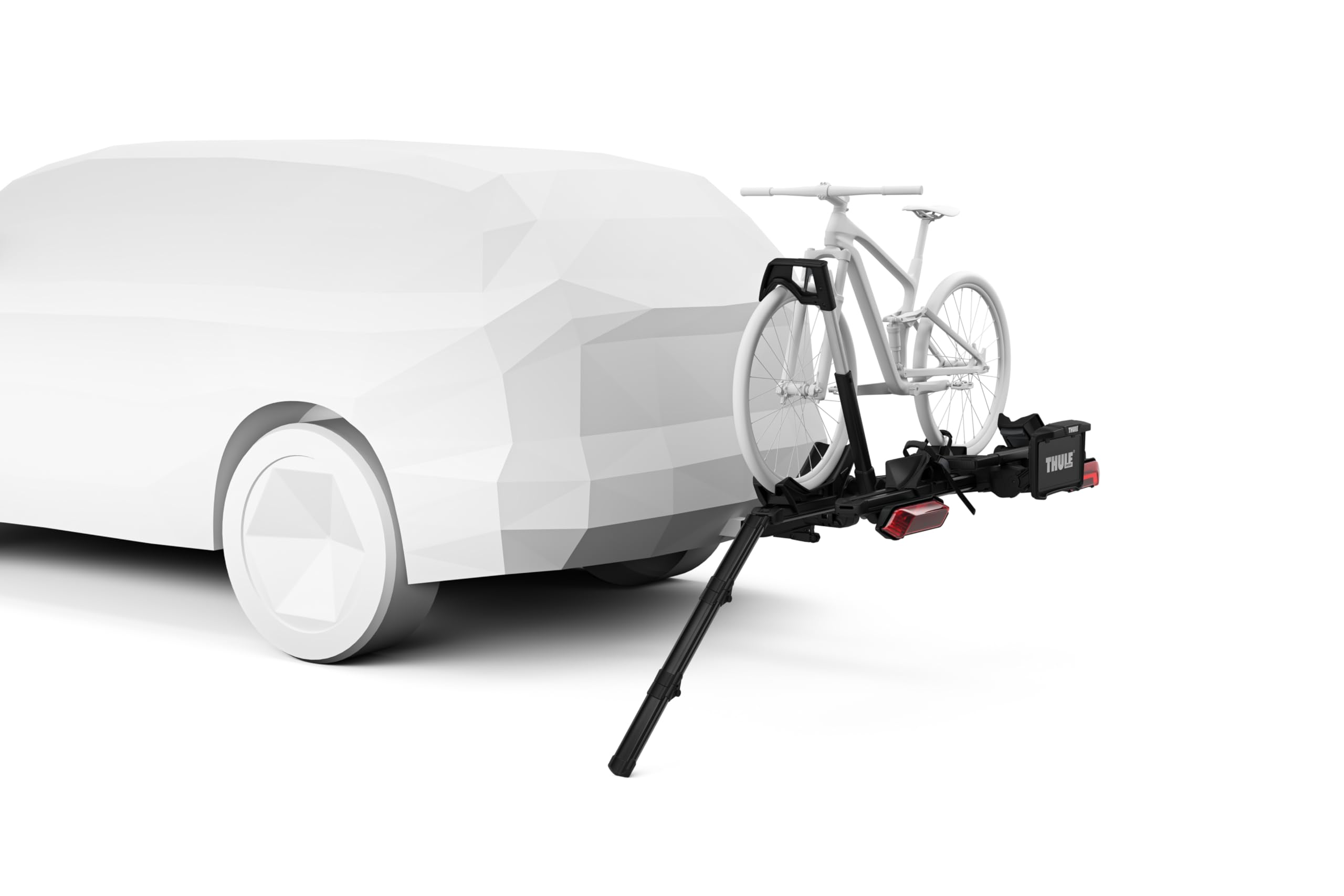 Thule ramp in use with e-bike illustrating safer rolling onto a Thule rack