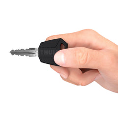 Thule Comfort key close-up in hand showing grip and one-key convenience benefit