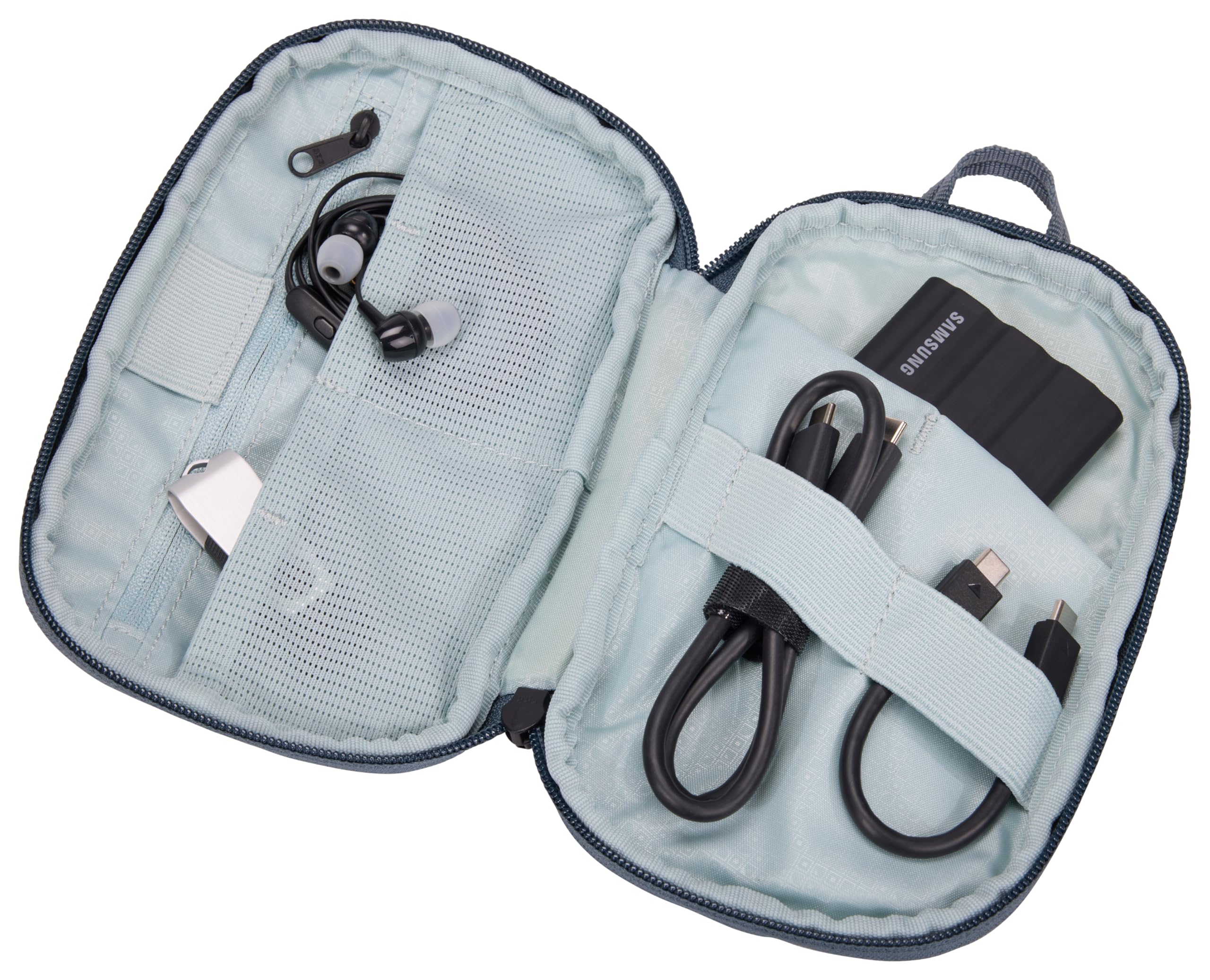 Thule PowerShuttle small nested in backpack for streamlined travel packing