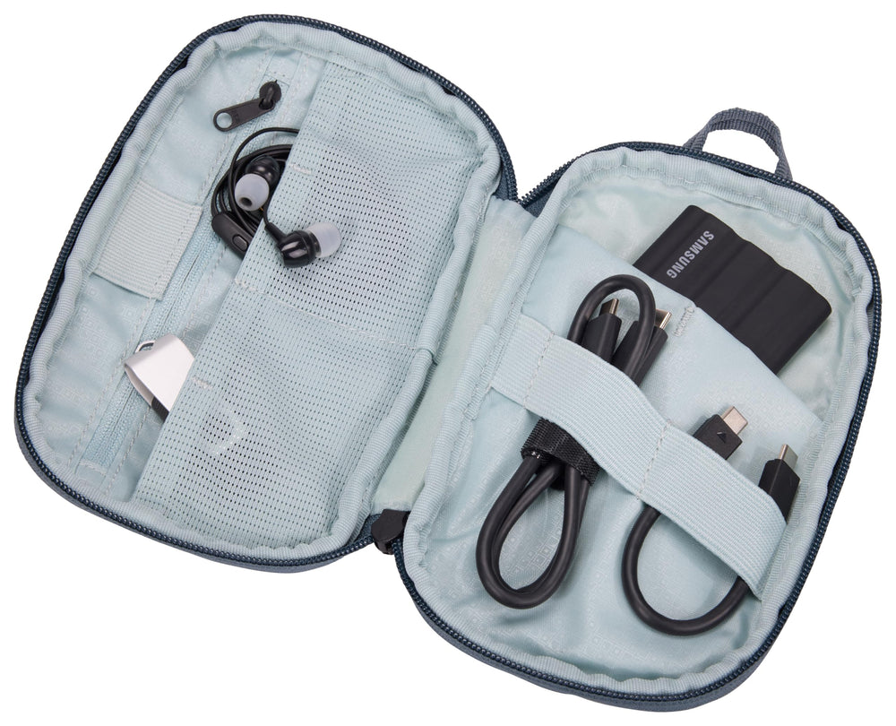 Thule PowerShuttle small nested in backpack for streamlined travel packing