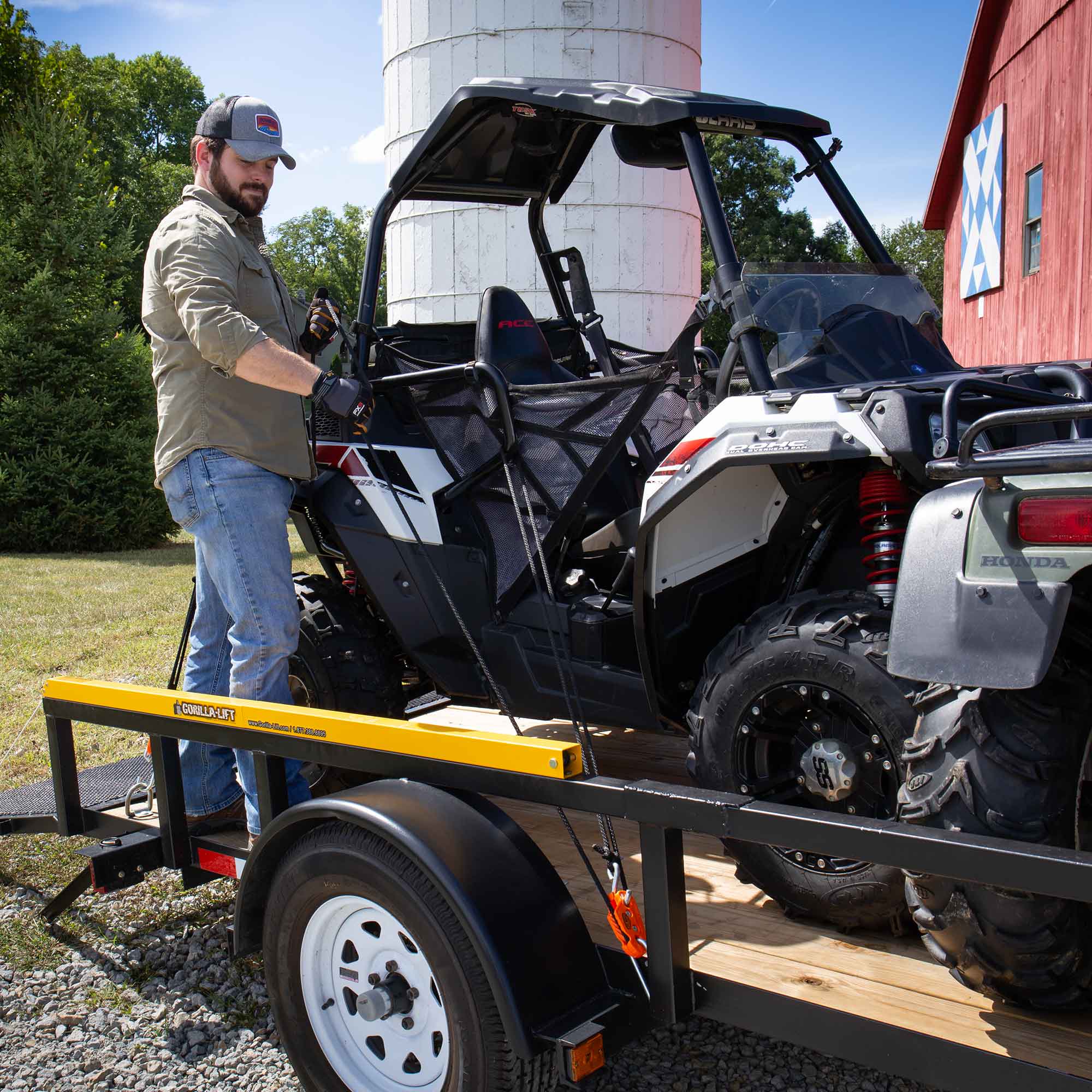 Tie Boss installed as a garage hoist holding cargo, illustrating easy one-person use