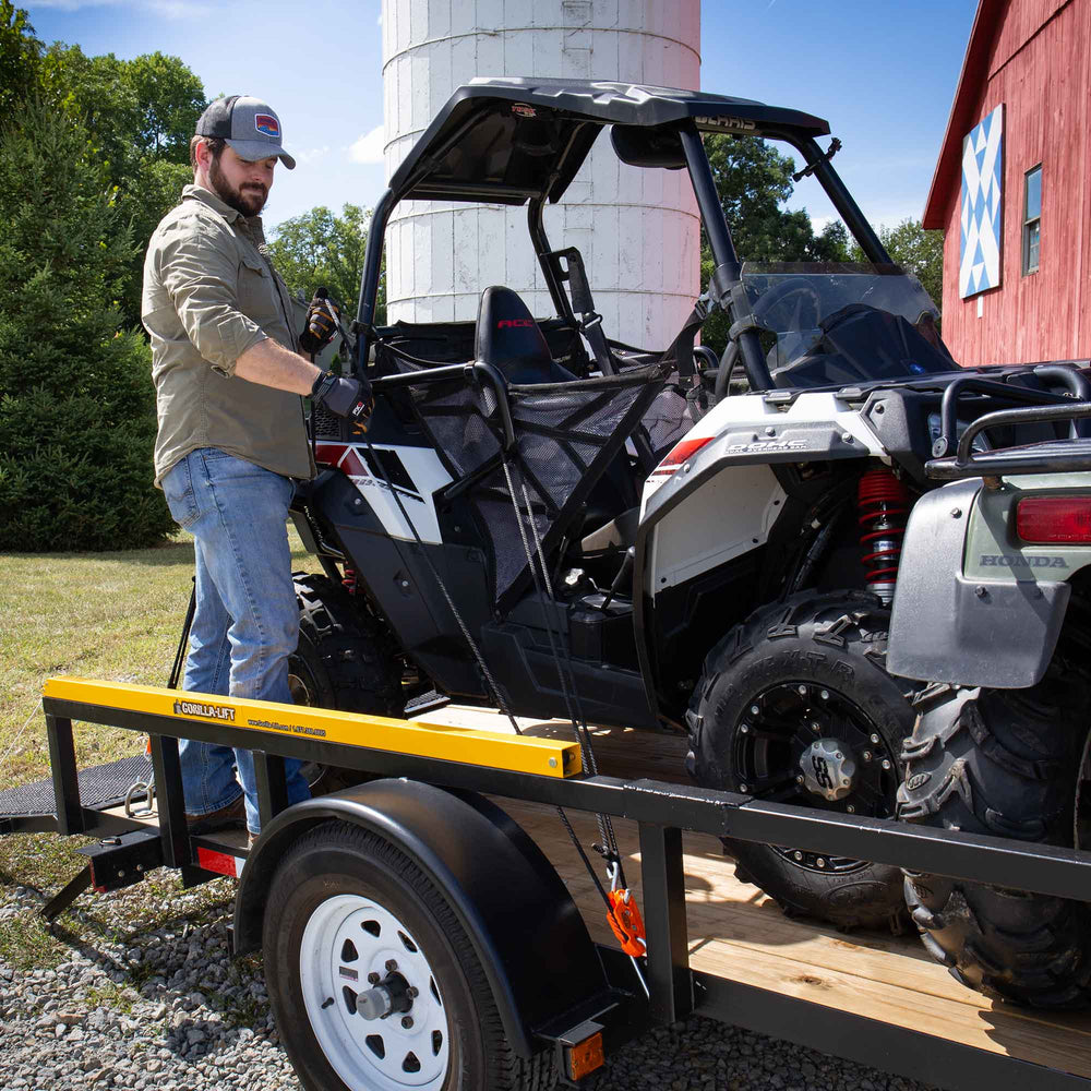 Tie Boss installed as a garage hoist holding cargo, illustrating easy one-person use