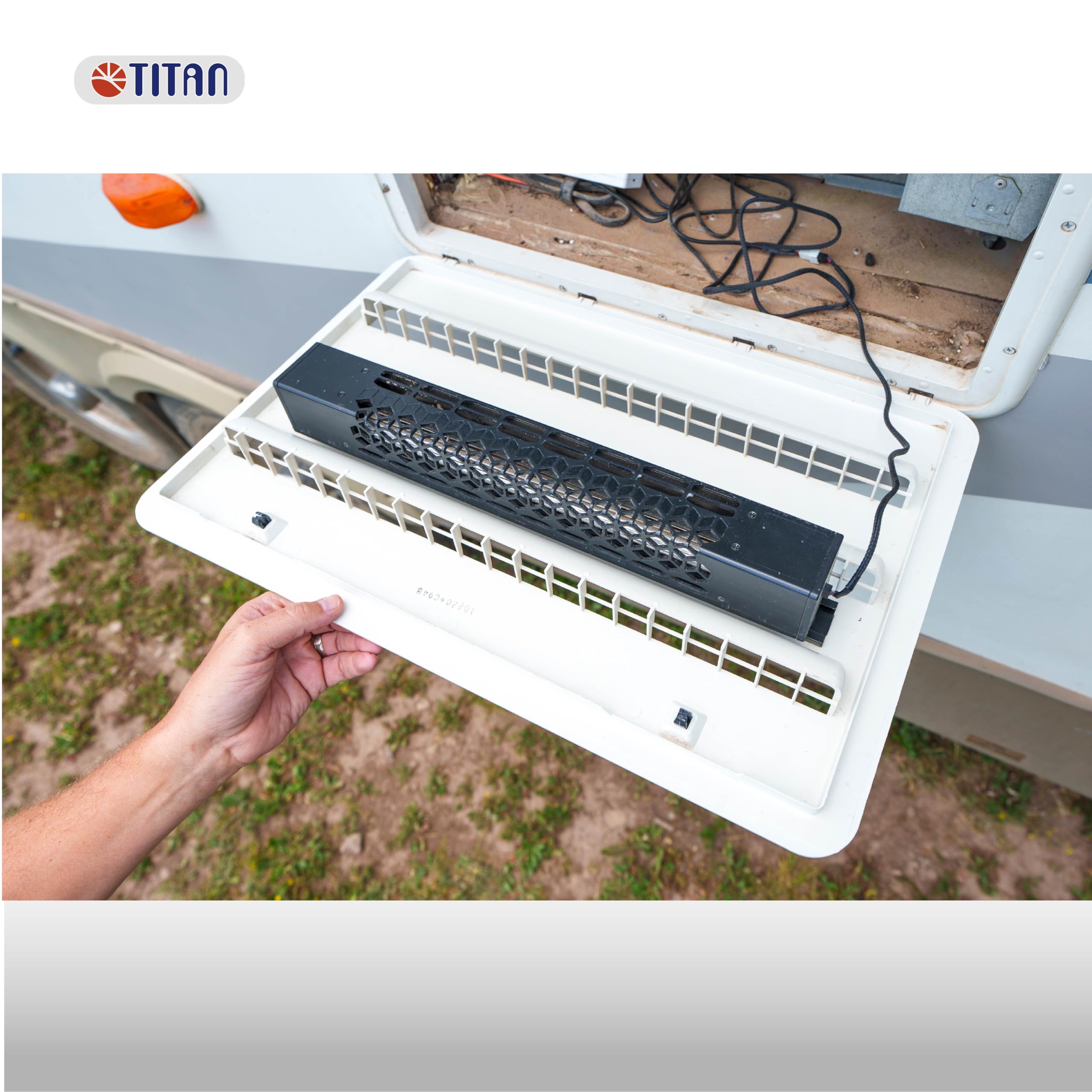 TITAN fan beside ruler showing compact long-profile sizing