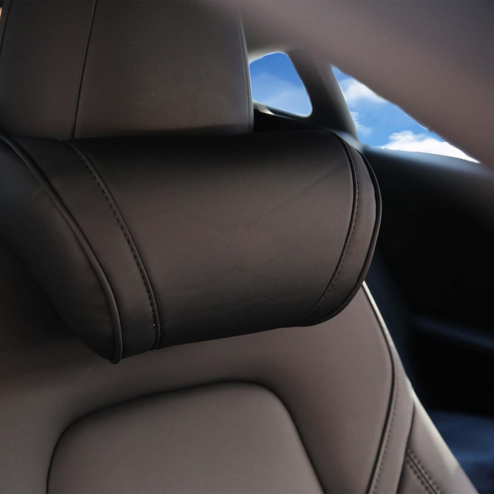 TOPABYTE driver using pillow for improved comfort on a commute