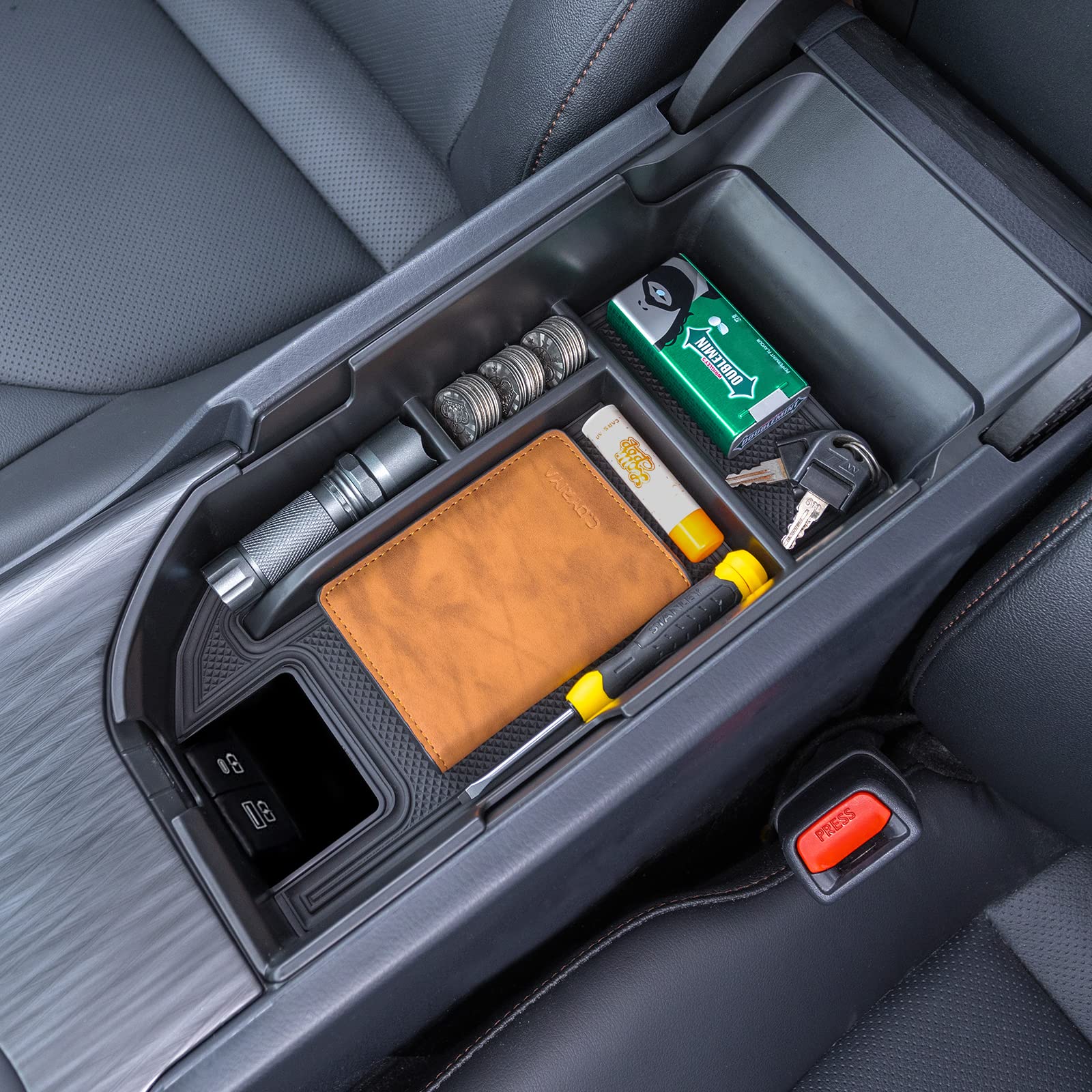 TOPINSTALL lifestyle shot inside Camry showing tidy, organized console