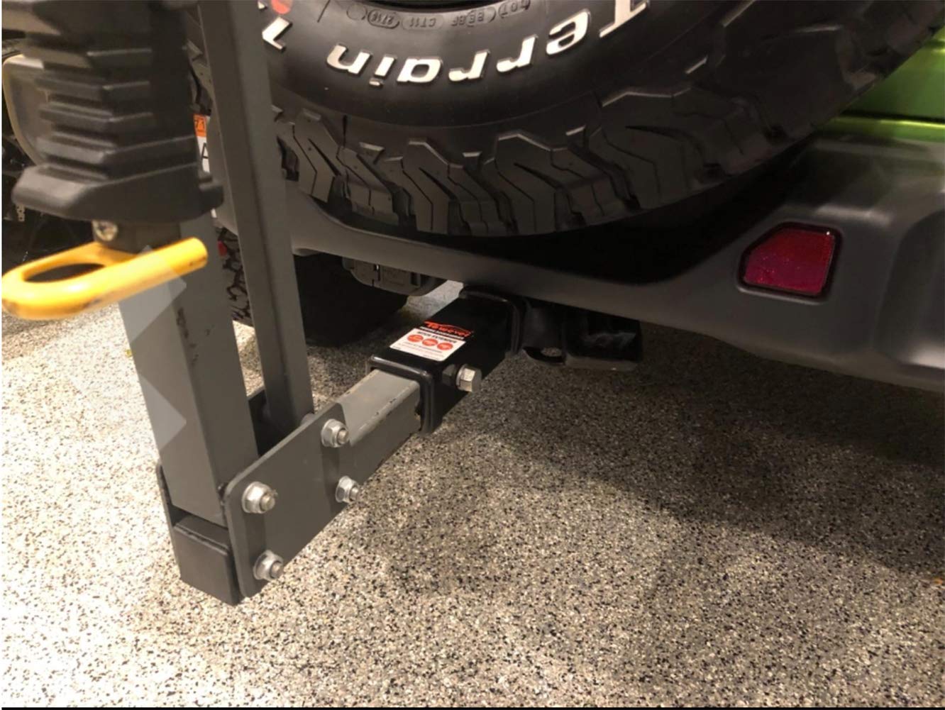 Towever with a bike rack attached illustrating safer tire clearance