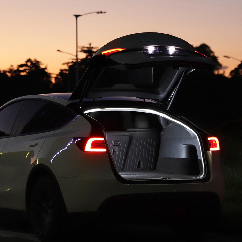 TPARTS lifestyle garage scene showing trunk light enhancing evening loading