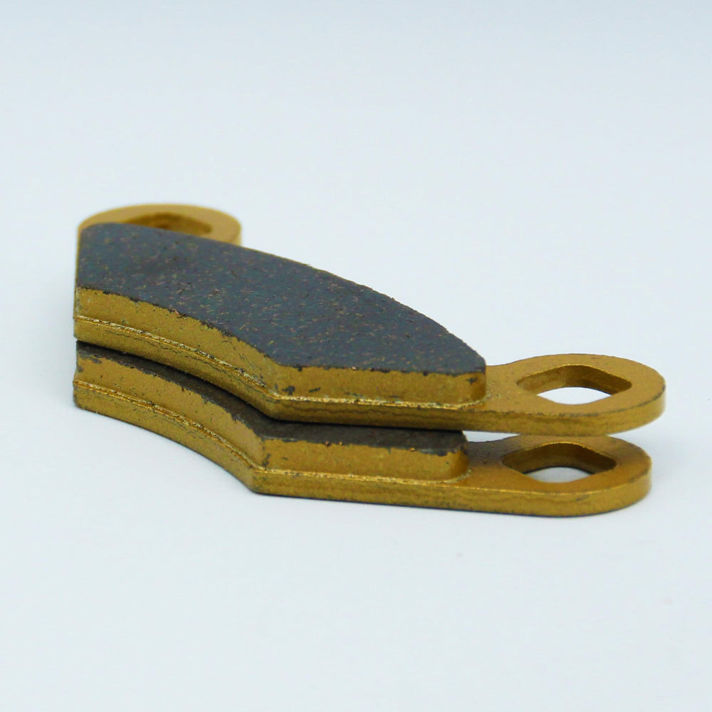 Traild pads next to ruler showing dimensions for accurate OE replacement