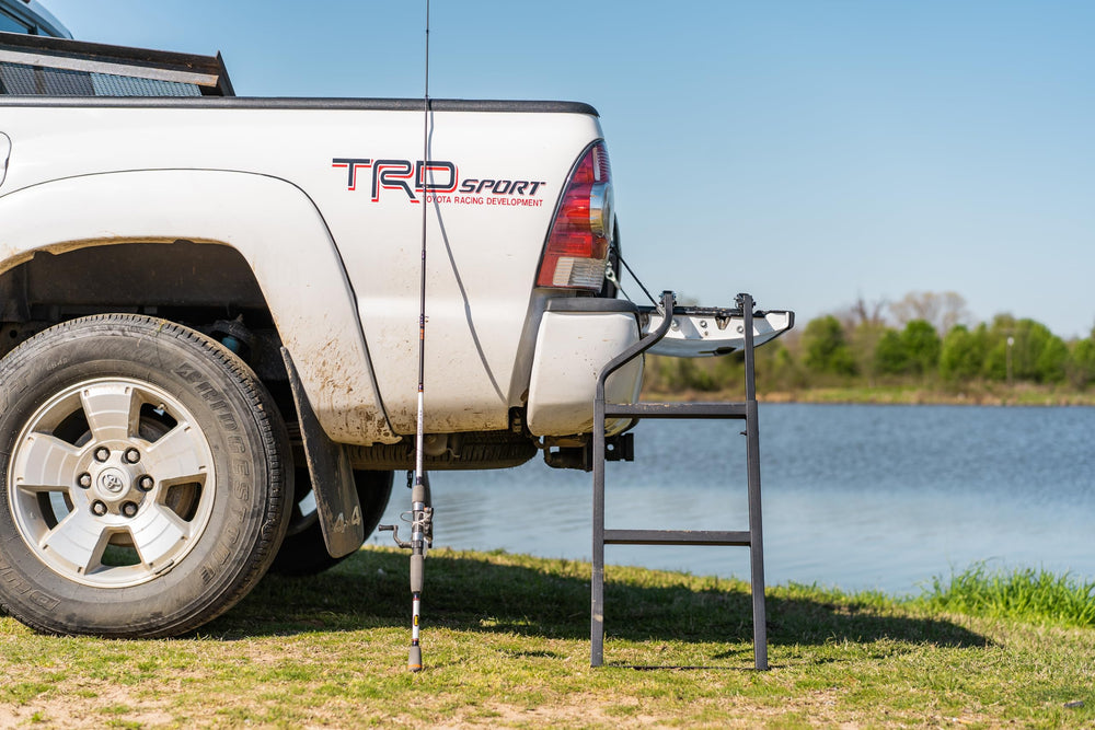 Traxion ladder folded against tailgate to save cargo space and stay tidy