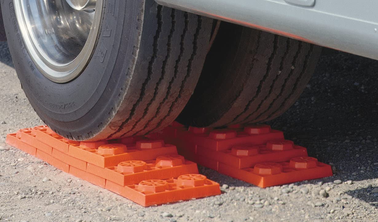 Tri-Lynx blocks under a jack pad creating a solid base for safer jack use