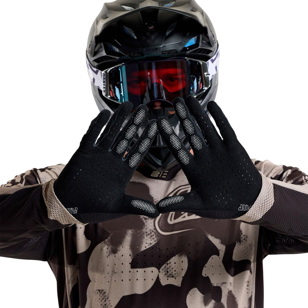 Troy Lee Designs cuff detail showing double-sided lining and secure comfortable fit benefit