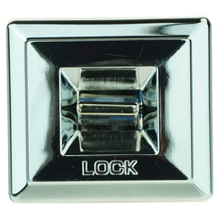 TRQ switch beside a coin to show scale and easy handling during installation