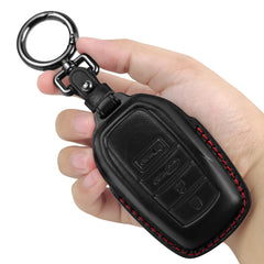 Tukellen front view of key fob cover showing black leather and red line, stylish protection