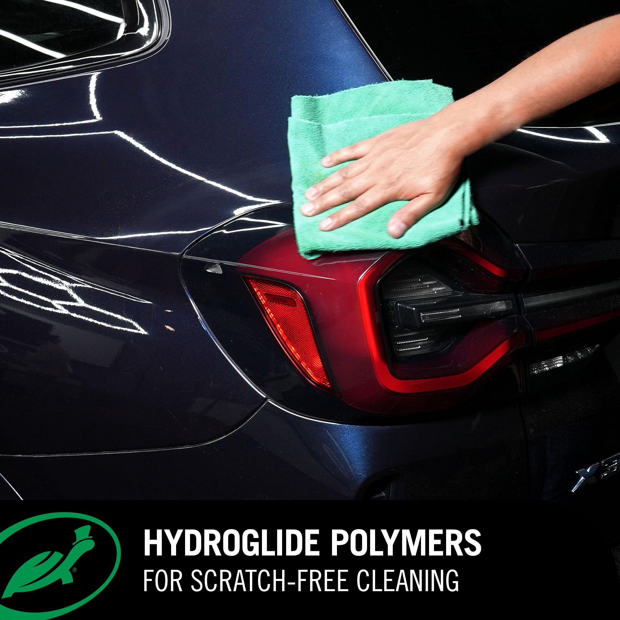 Turtle Wax beaded water on hood showing hydrophobic protection benefit