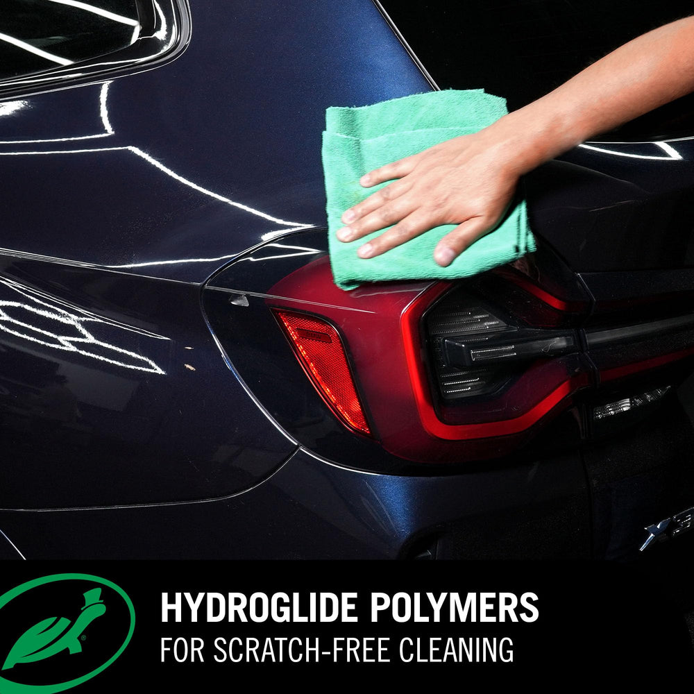 Turtle Wax beaded water on hood showing hydrophobic protection benefit