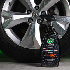 Turtle Wax spraying onto car paint, demonstrating easy application and quick shine