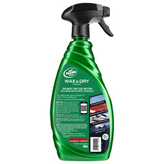 Turtle Wax spray action applied to wet car paint for fast drying and shine