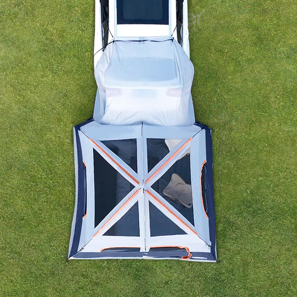 unp tent at campsite in use providing extra sleeping and storage space