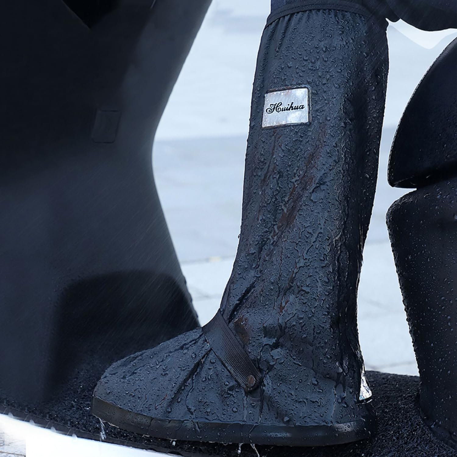 USHTH in-use on a cyclist keeping shoes dry during rainy commute