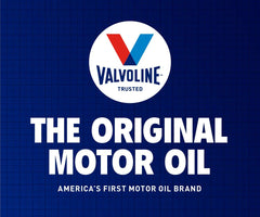 Valvoline one-gallon jug next to ruler showing scale and gallon capacity