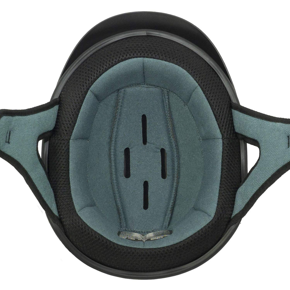 VCAN helmet next to a ruler to show scale and compact, lightweight benefit
