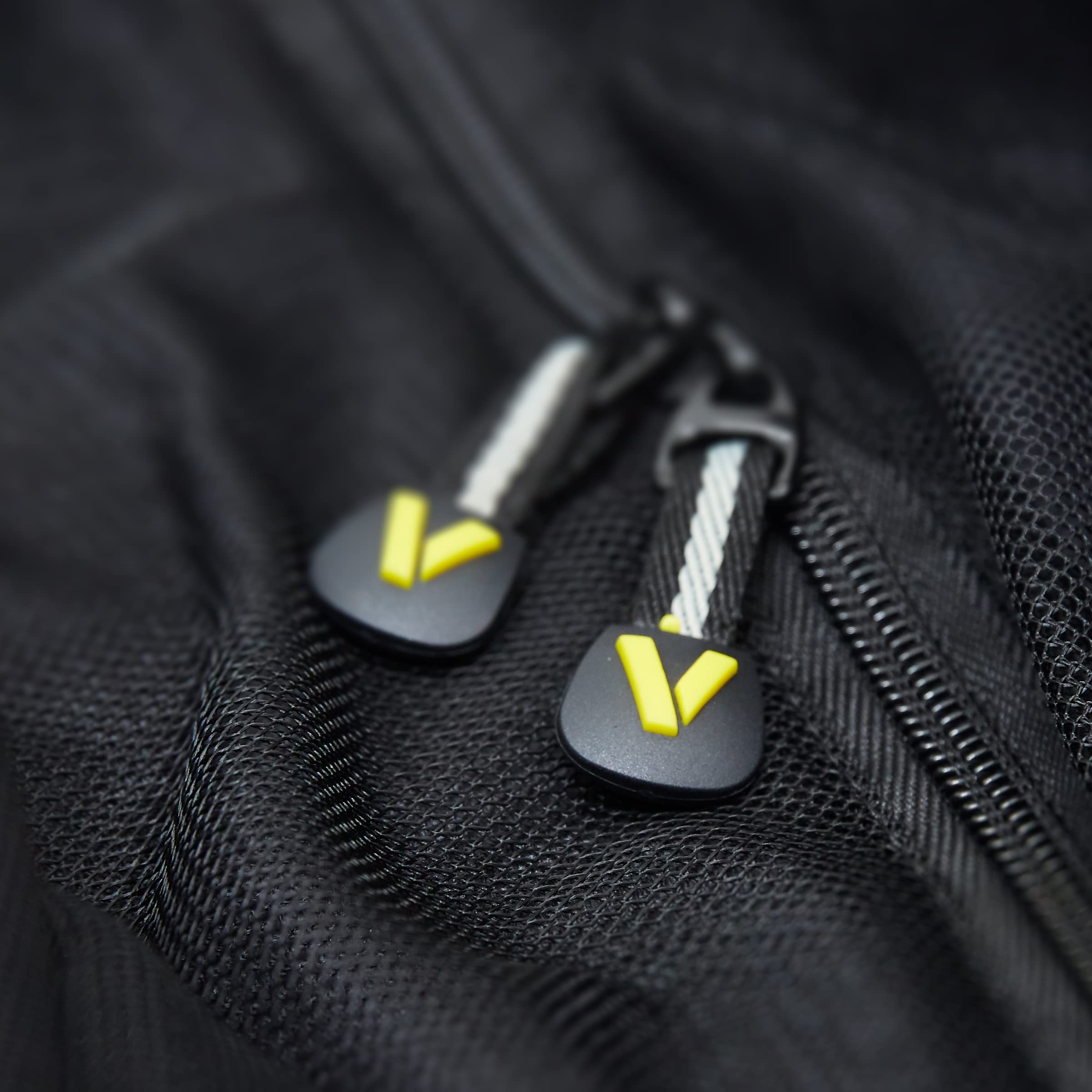 Veer rear basket fabric detail showing water-resistant material benefit