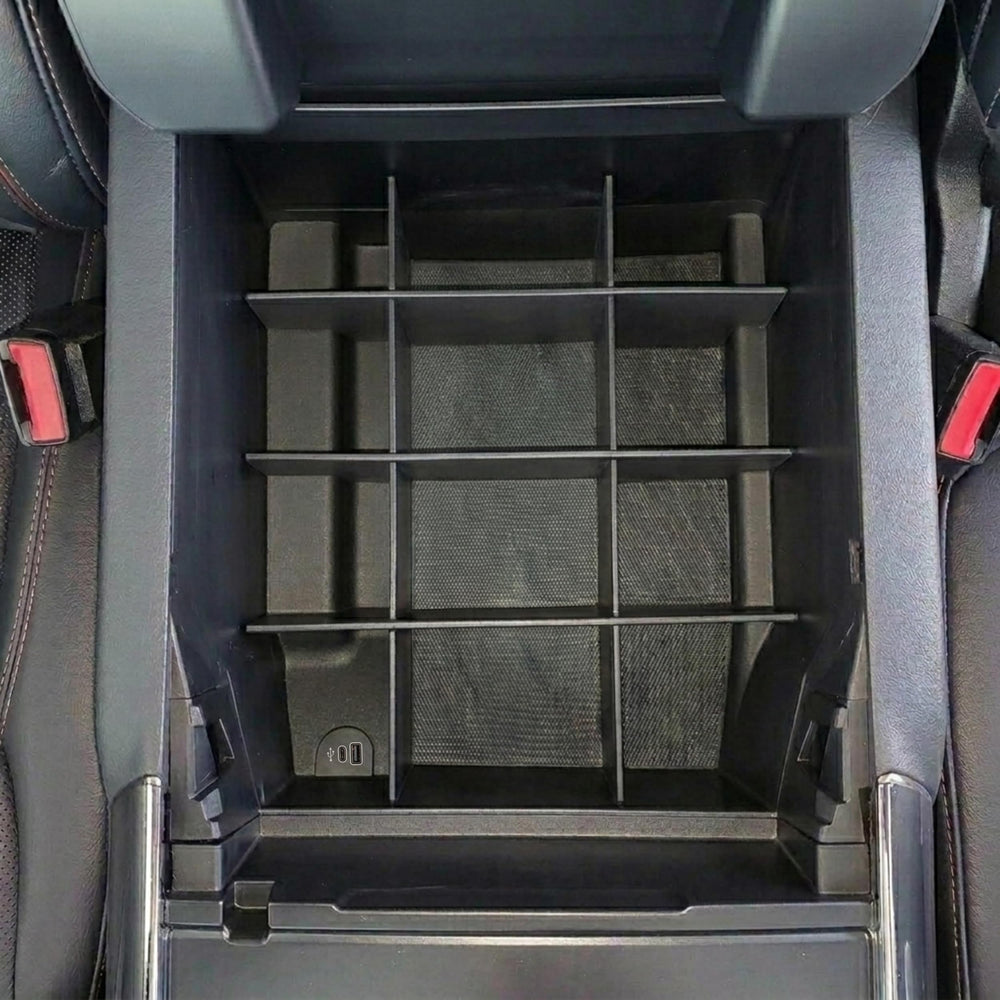 Vehicle OCD upper tray compatibility shot showing SLX169 fits with OEM tray