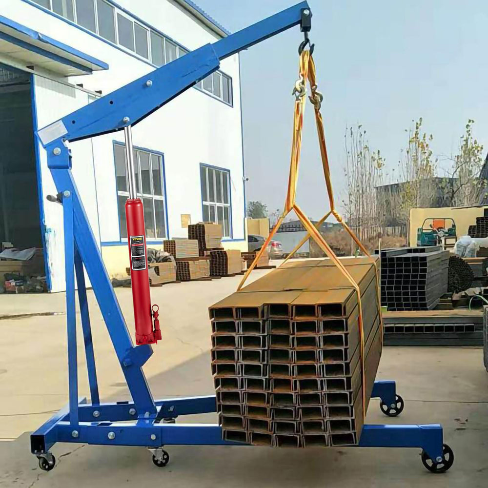 VEVOR ram installed on engine hoist showing real-world lifting application reliability