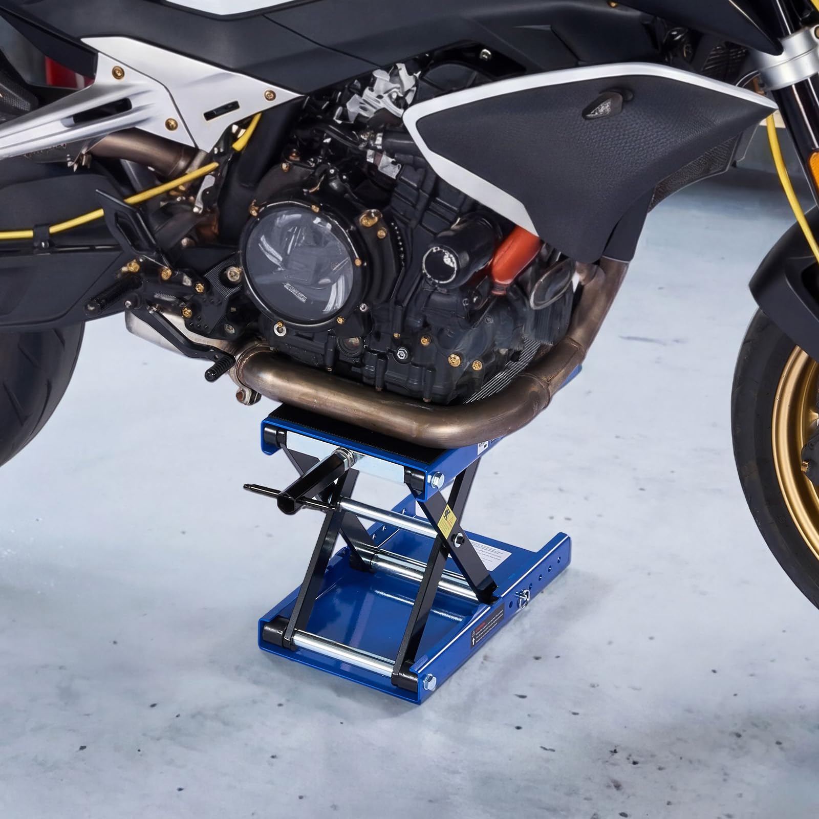 VEVOR lift next to motorcycle showing size and scale benefit