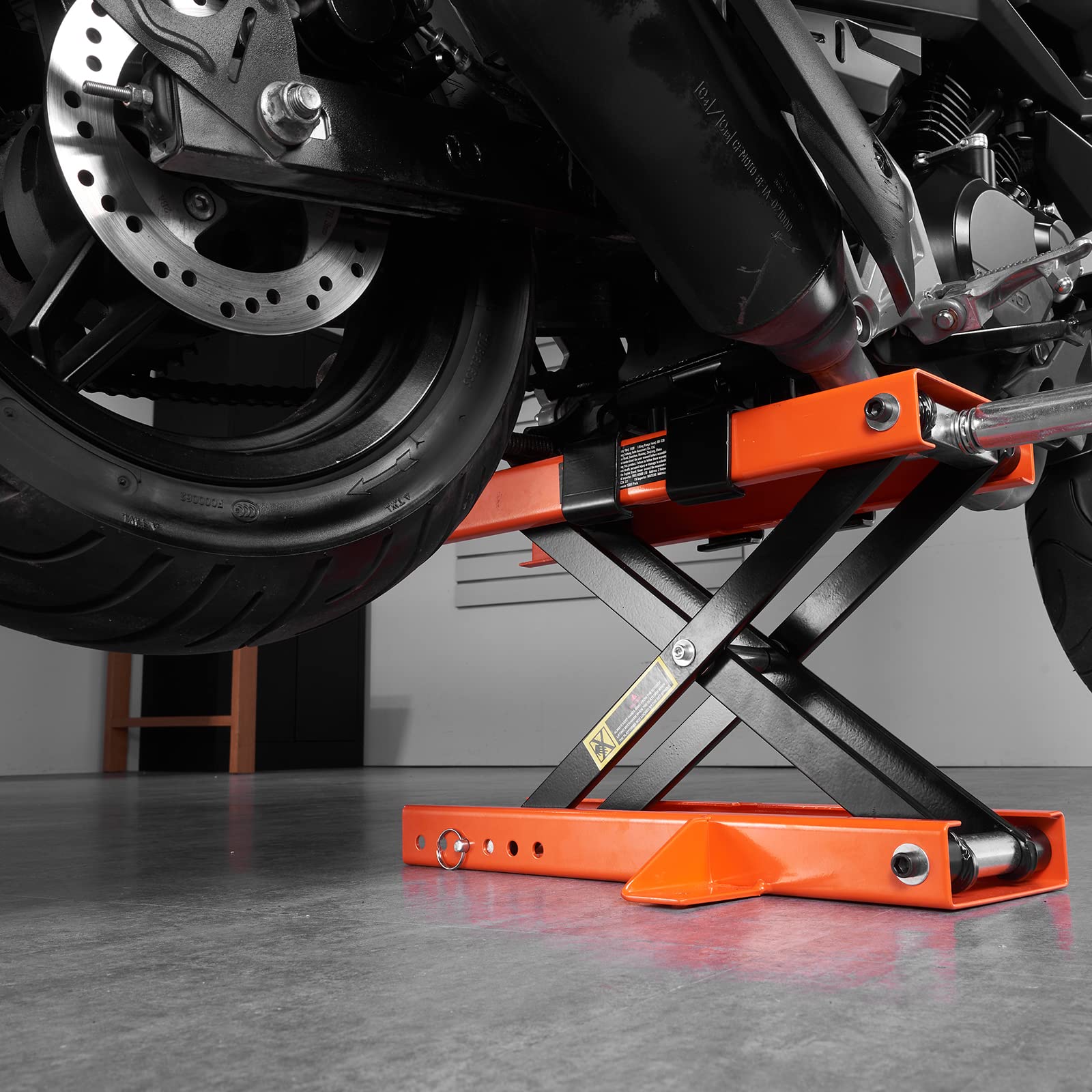 VEVOR scale comparison next to motorcycle showing load capability benefit