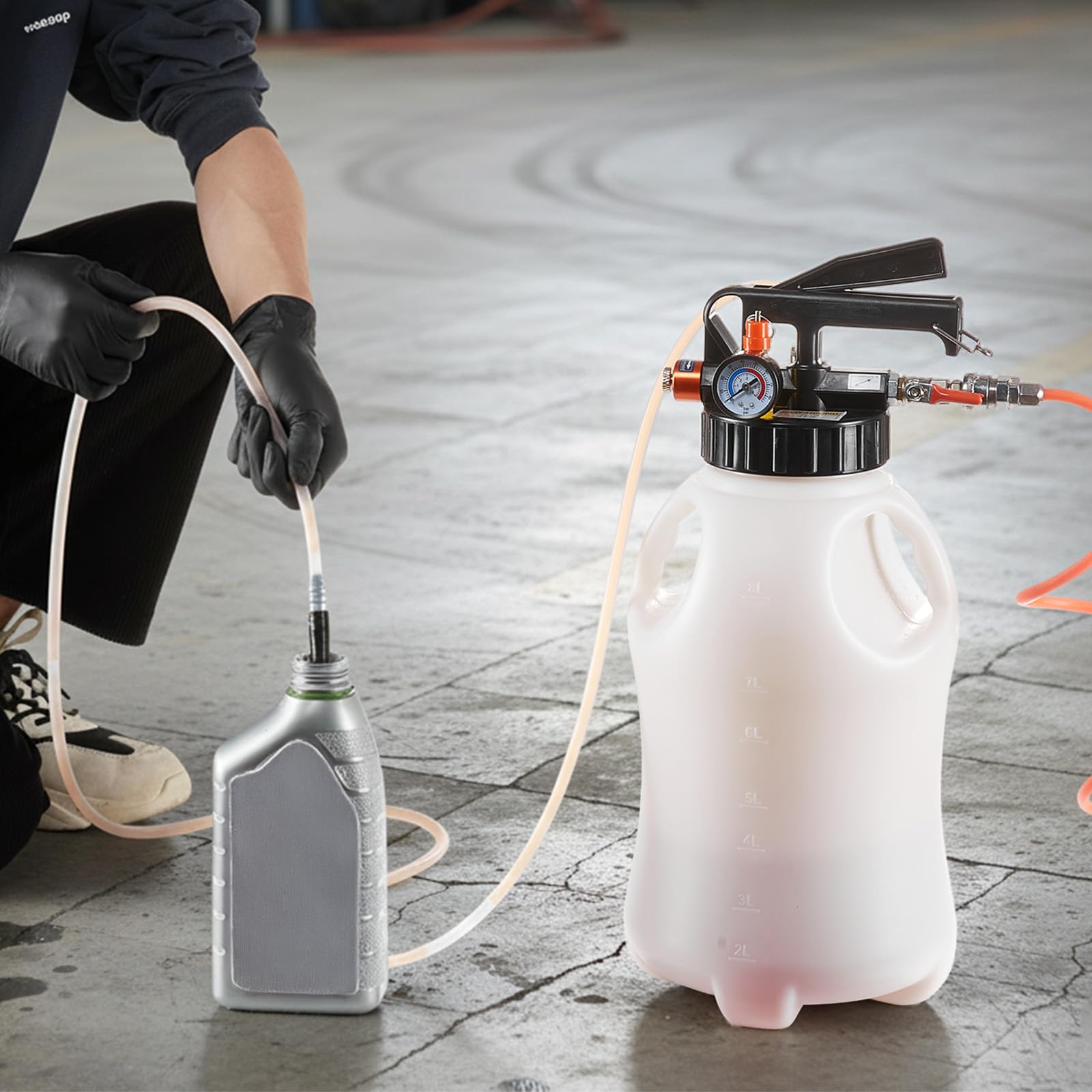 VEVOR pump beside gallon cans showing 8 L tank capacity and scale