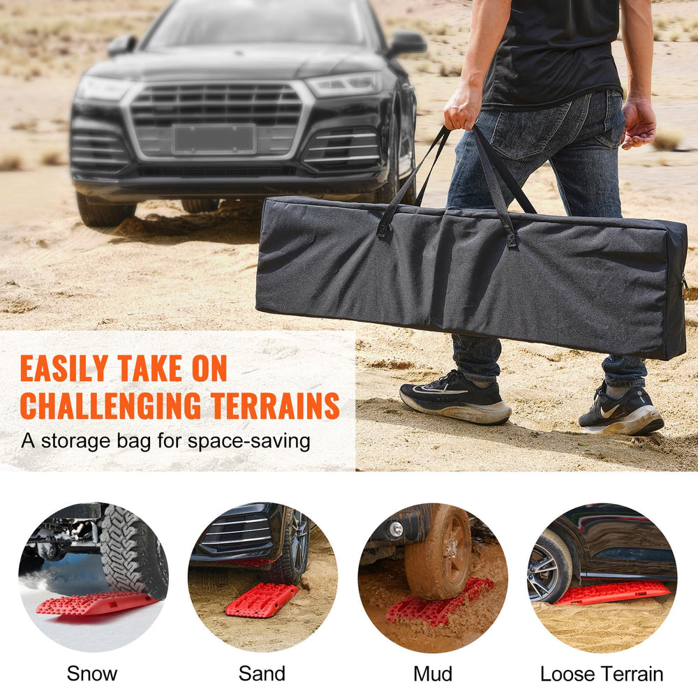 VEVOR traction boards deployed in sand aiding vehicle escape from soft dunes