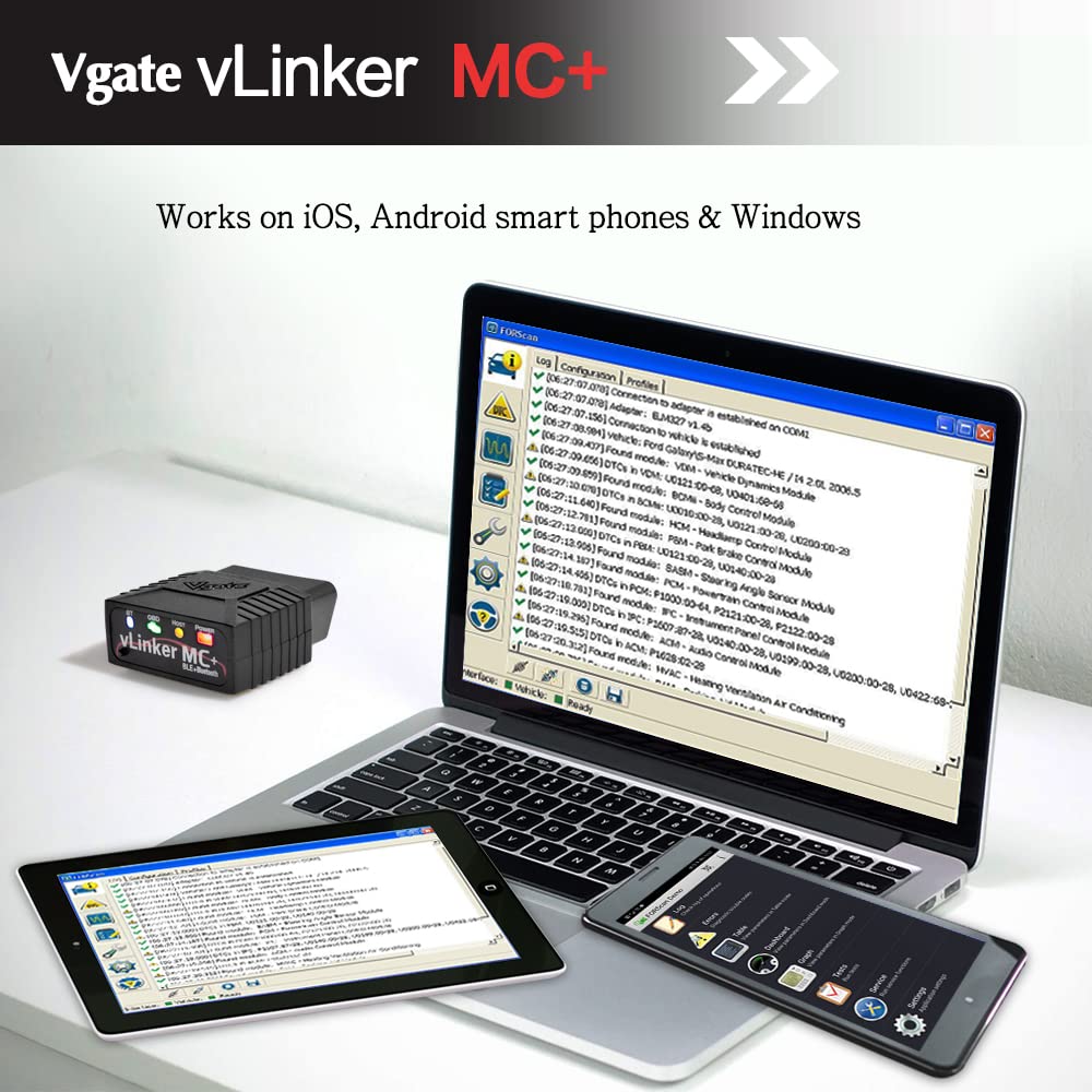 Vgate vLinker MC+ beside a key for size comparison showing small footprint