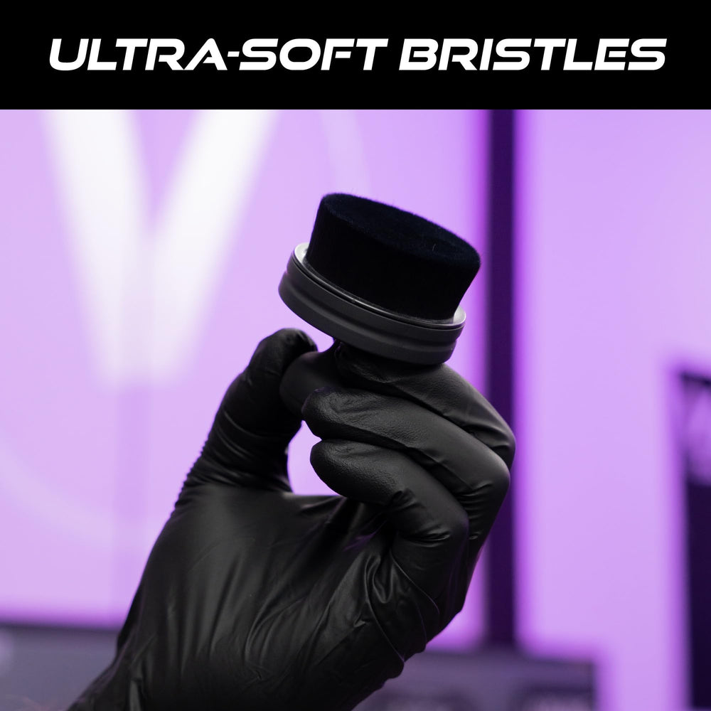 VIKING brush held in hand to show compact size and maneuverability