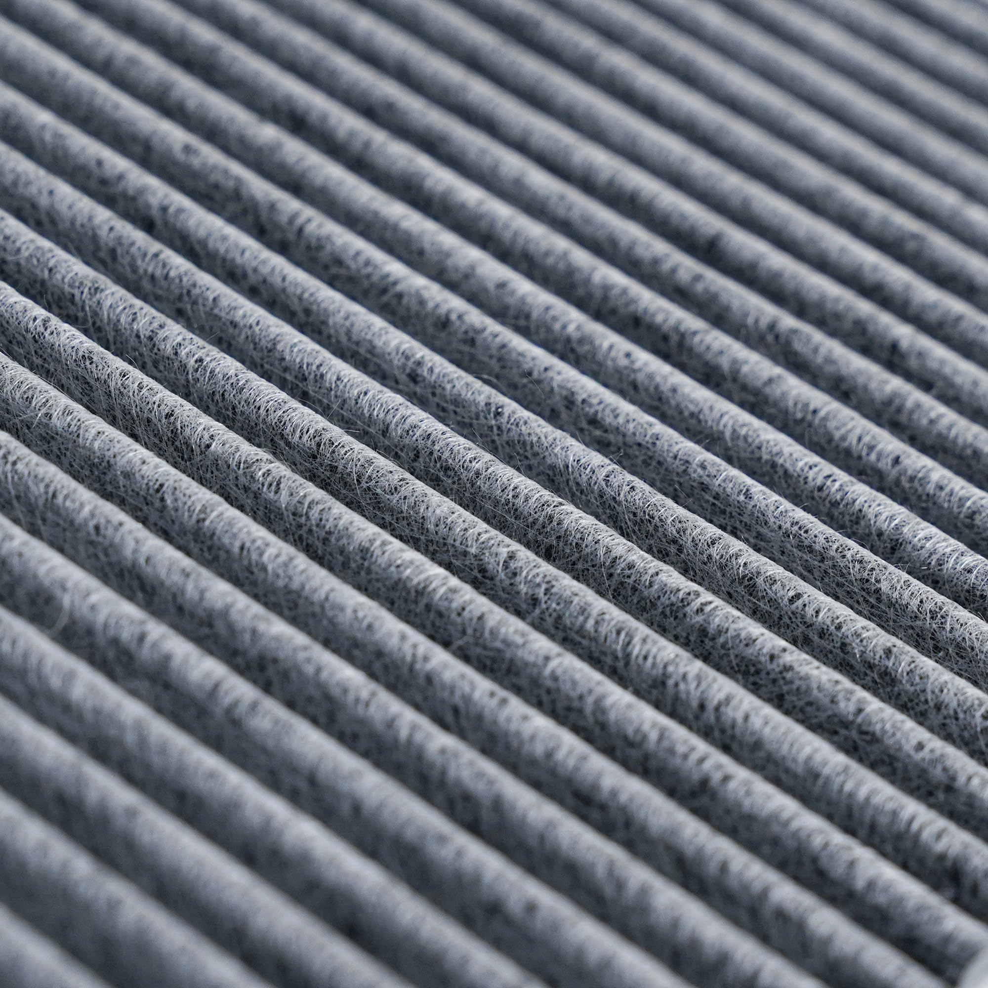Close-up of VION activated carbon layer highlighting odor adsorption and improved comfort