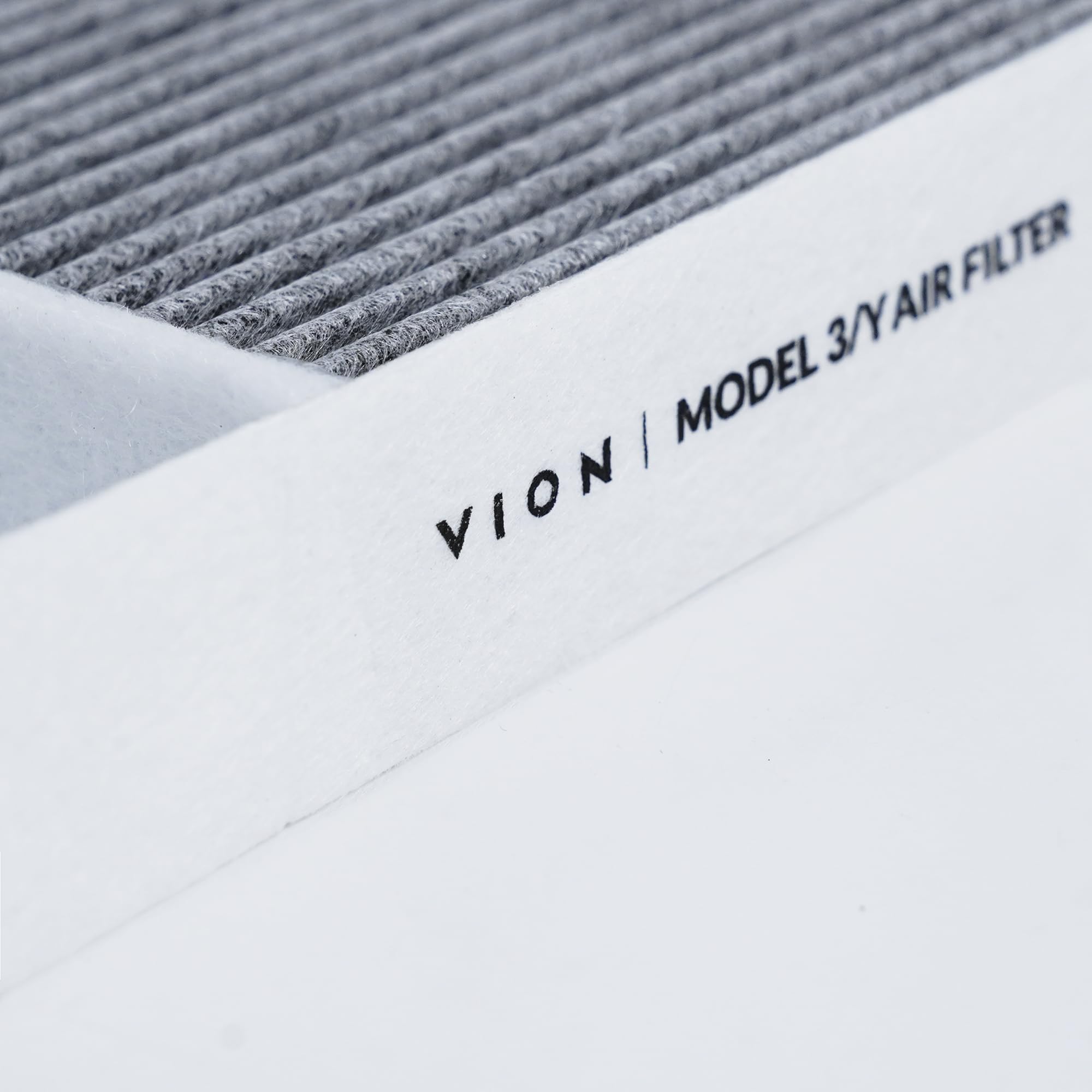 VION filter positioned in Tesla Model 3 filter housing demonstrating correct fit and seal