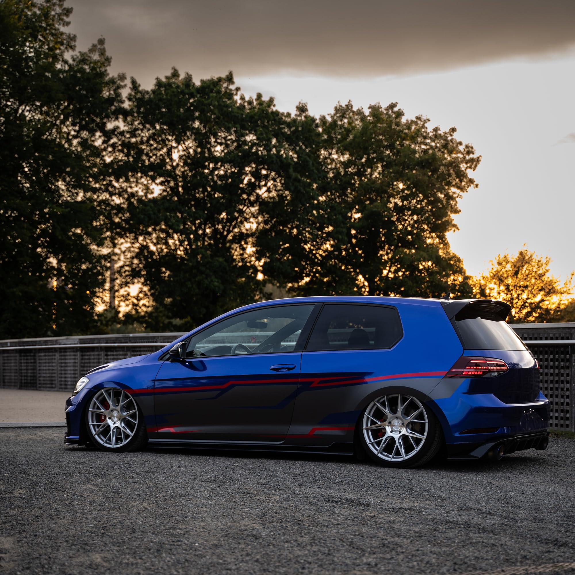 VViViD Neptune Pearl Blue wrapped car panel showing professional paint-like result