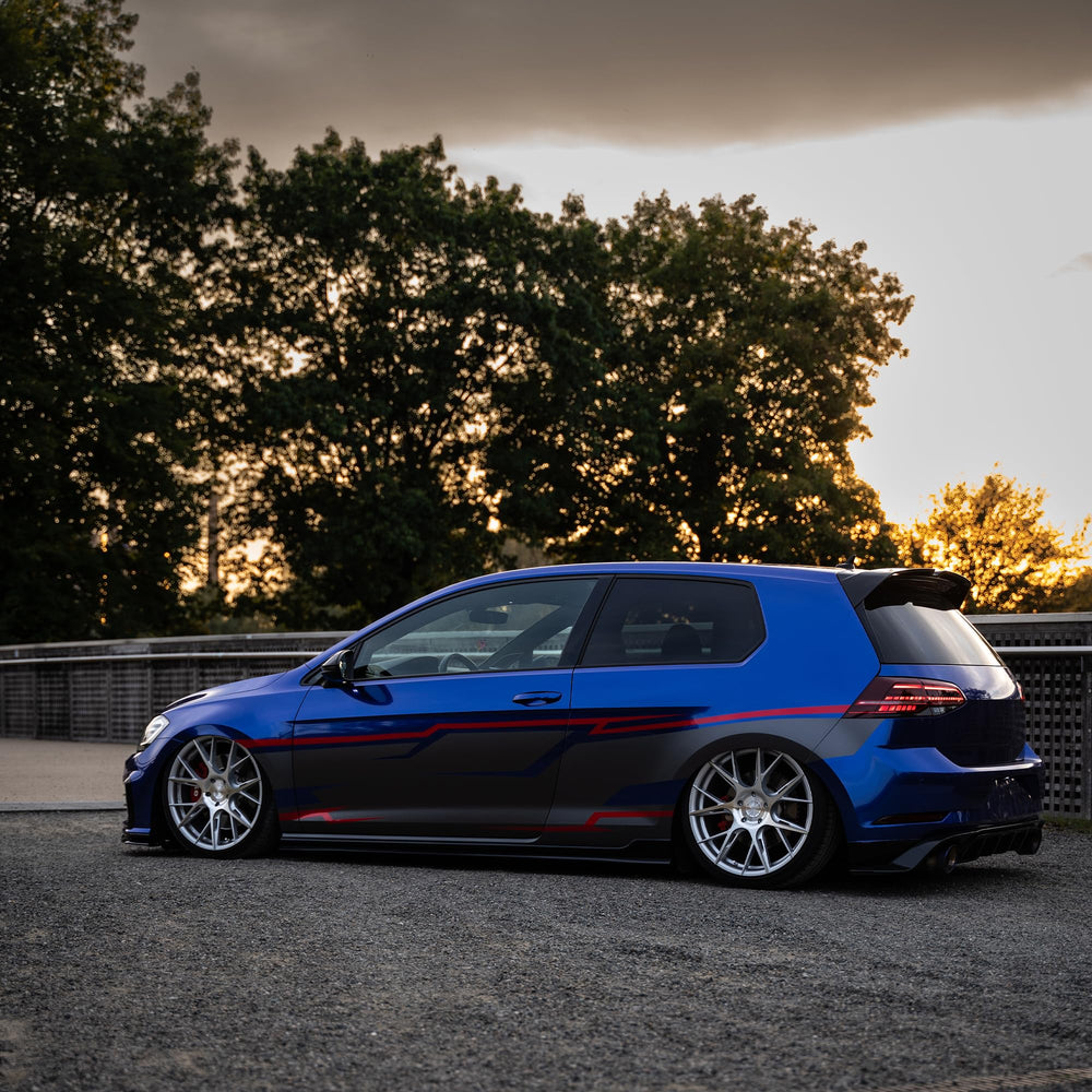 VViViD Neptune Pearl Blue wrapped car panel showing professional paint-like result