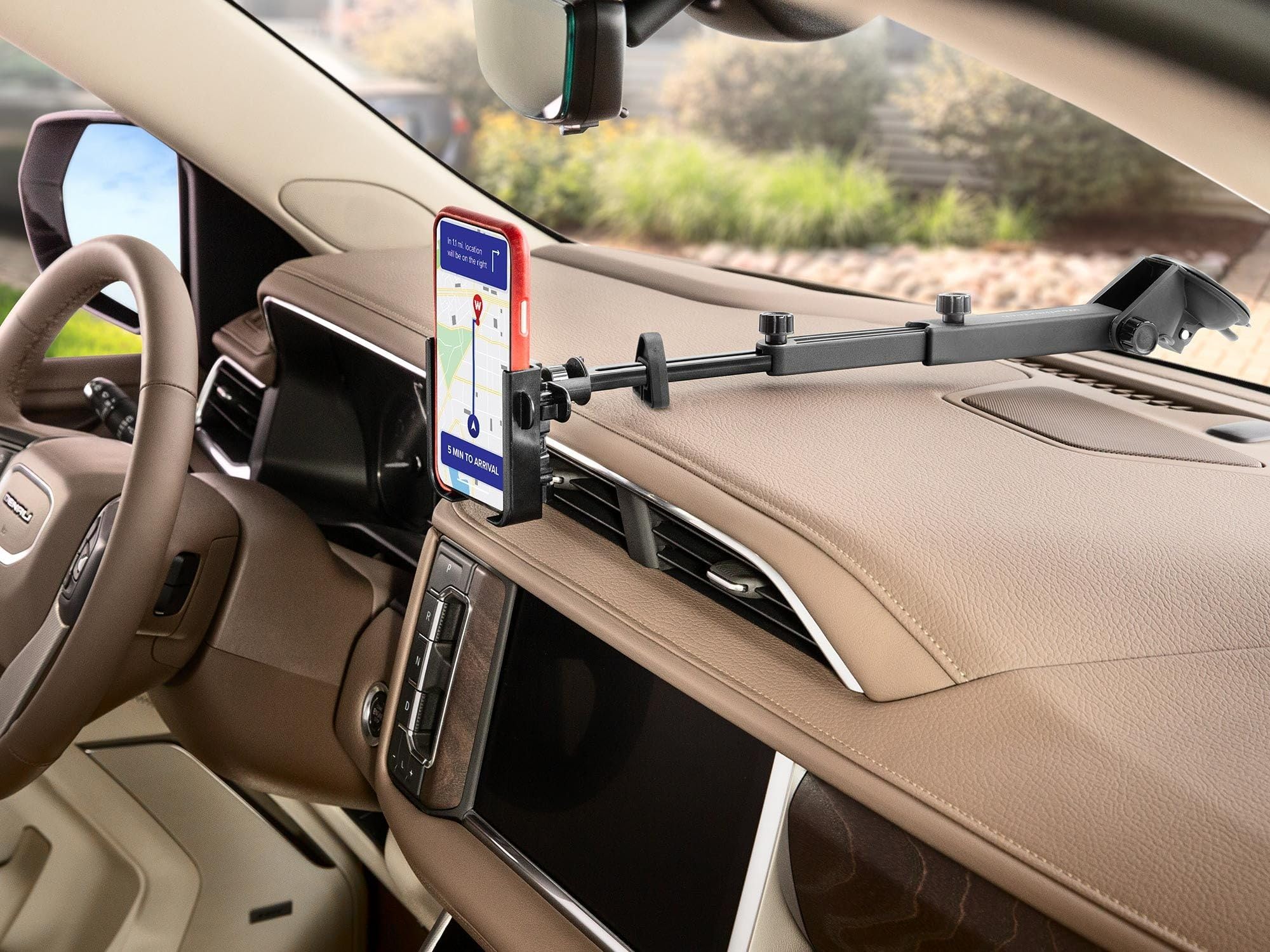 WeatherTech WindshieldFone holder closeup showing expandable jaws and secure grip benefit