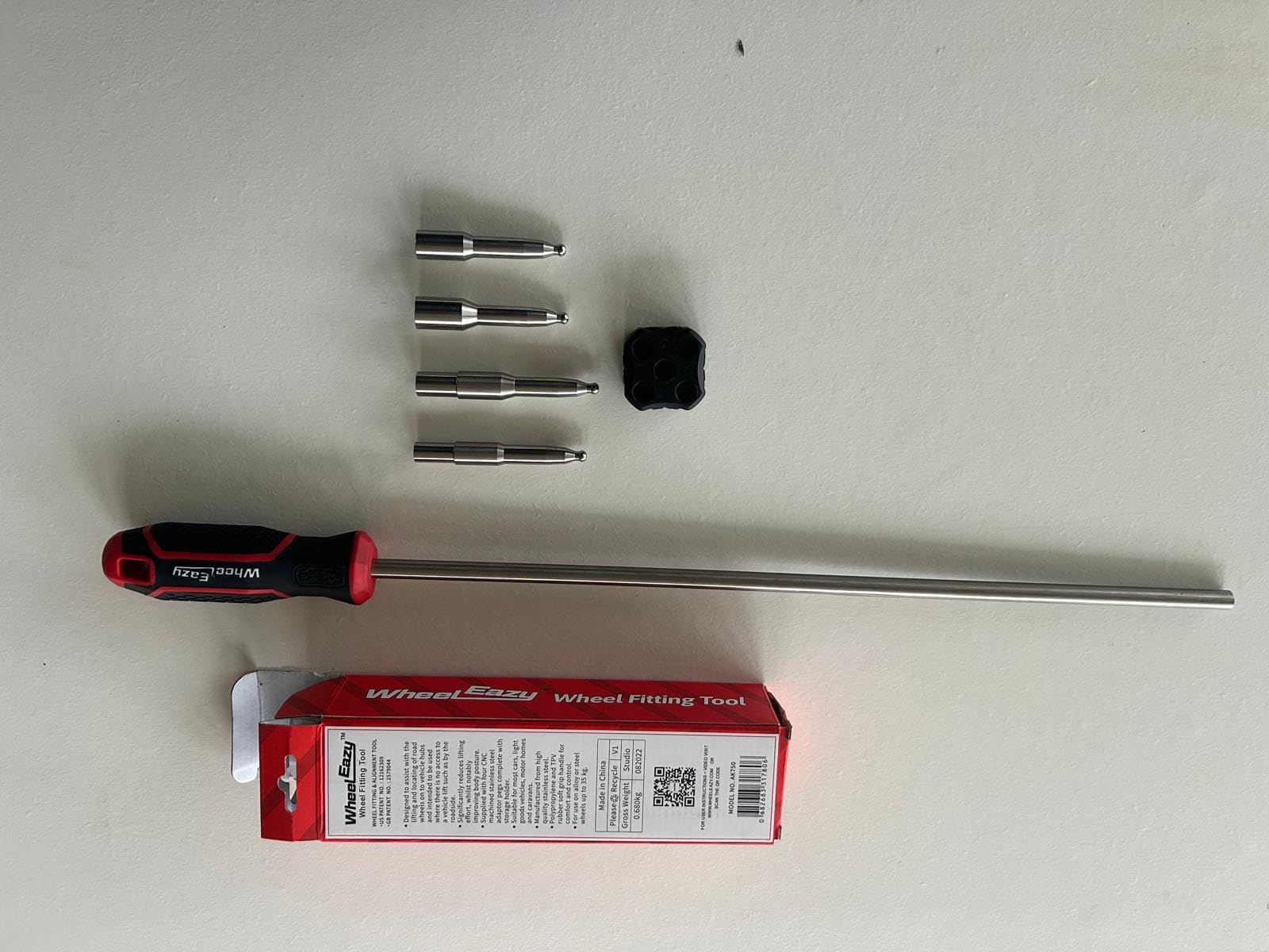 WheelEazy adaptor pegs in storage holder for organised transport