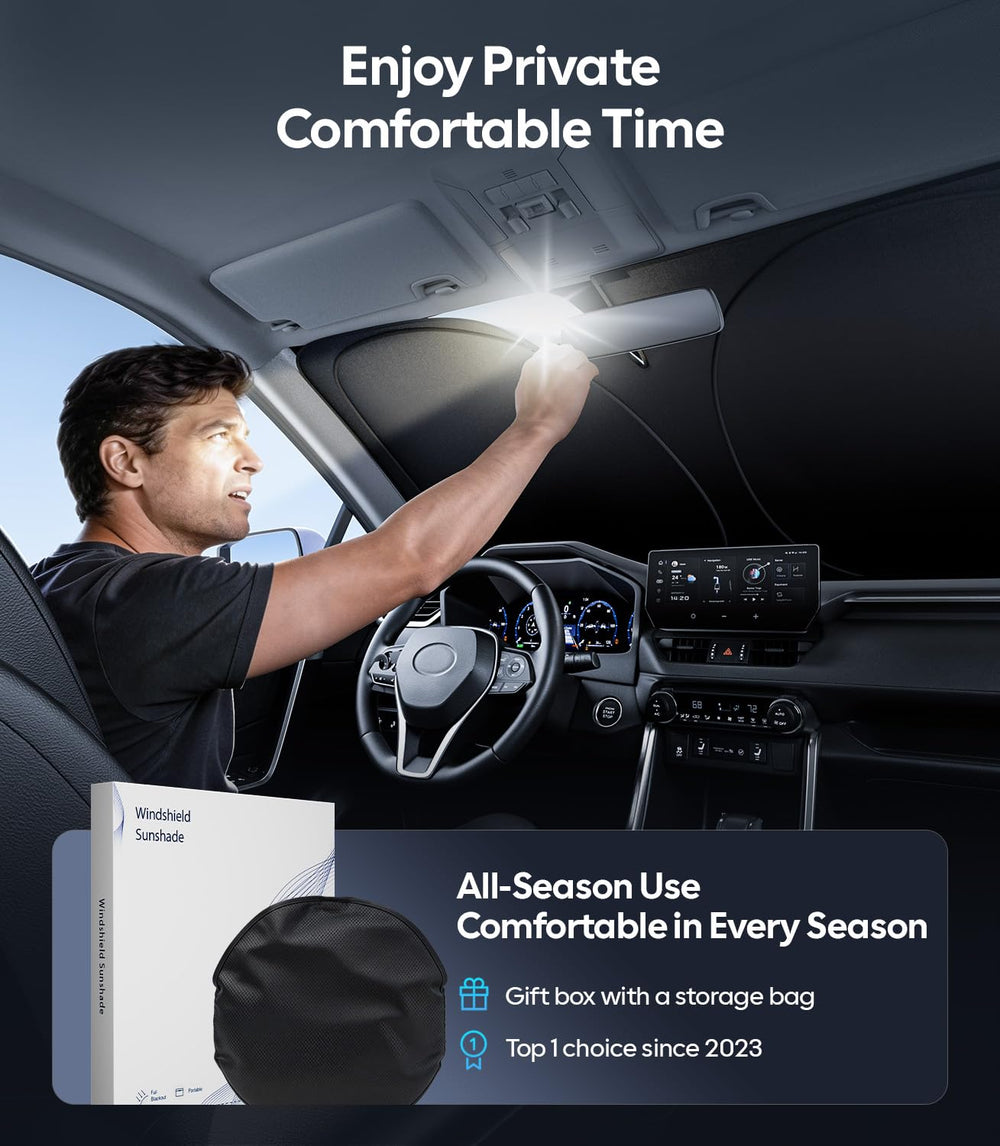 Wigoo sunshade beside steering wheel for scale to show windshield coverage