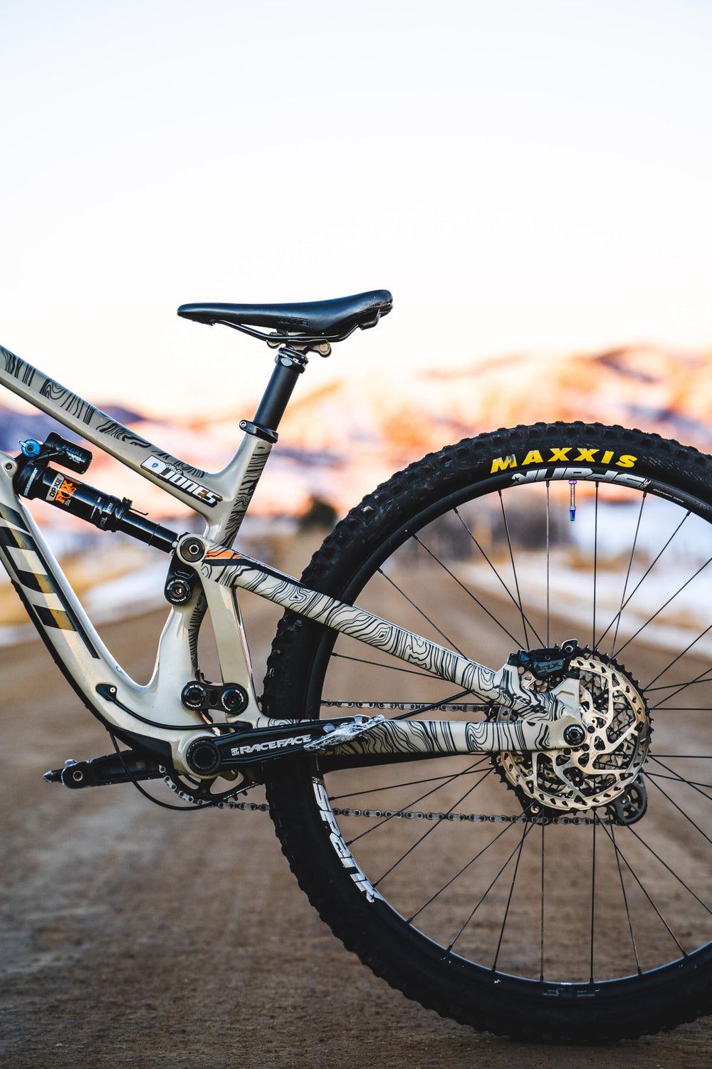 WilderWild protected bike on mountain trail illustrating rugged durability benefit